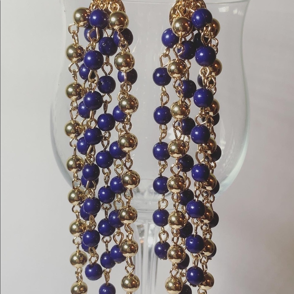 Gold and blue dangling earrings